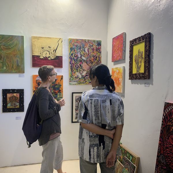 Guests wandering through the Hyang Tresna exhibition